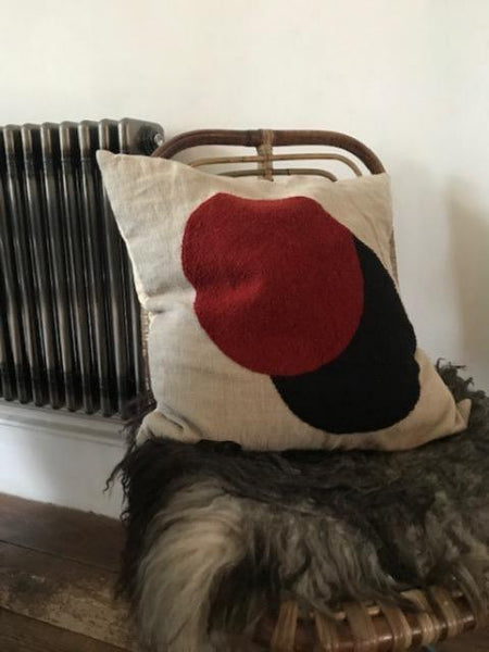 Circles embroidered cushion
