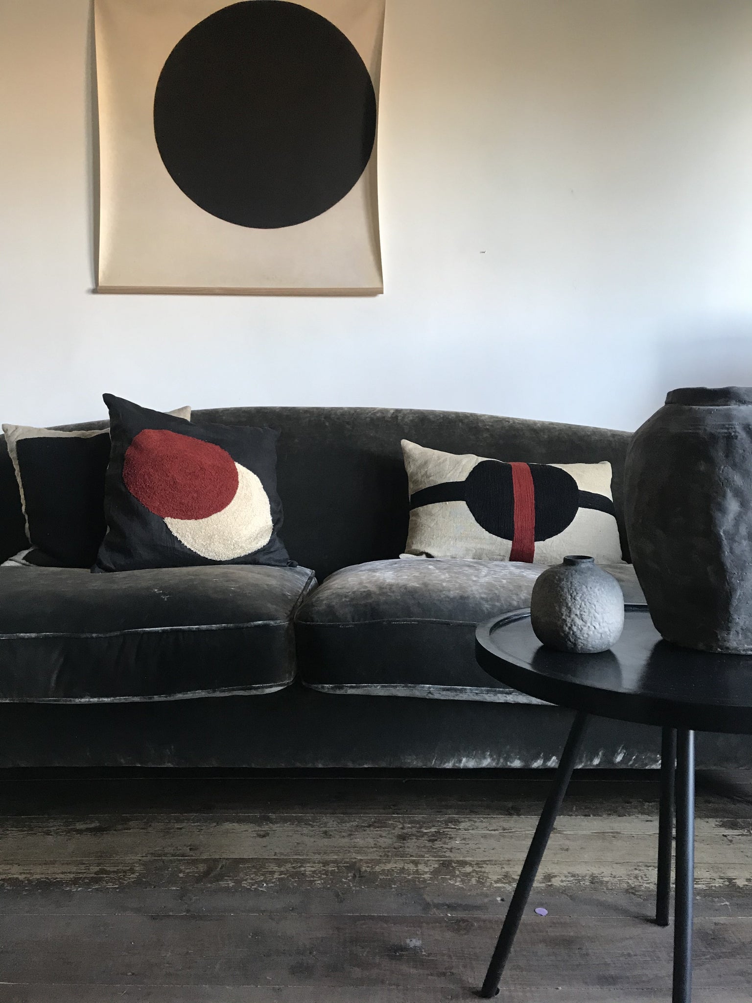 Circles embroidered cushion - black